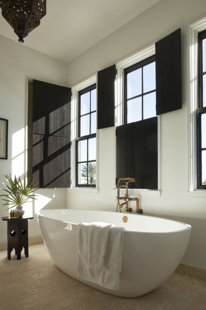 Bathroom-with-wooden-interior-shutters