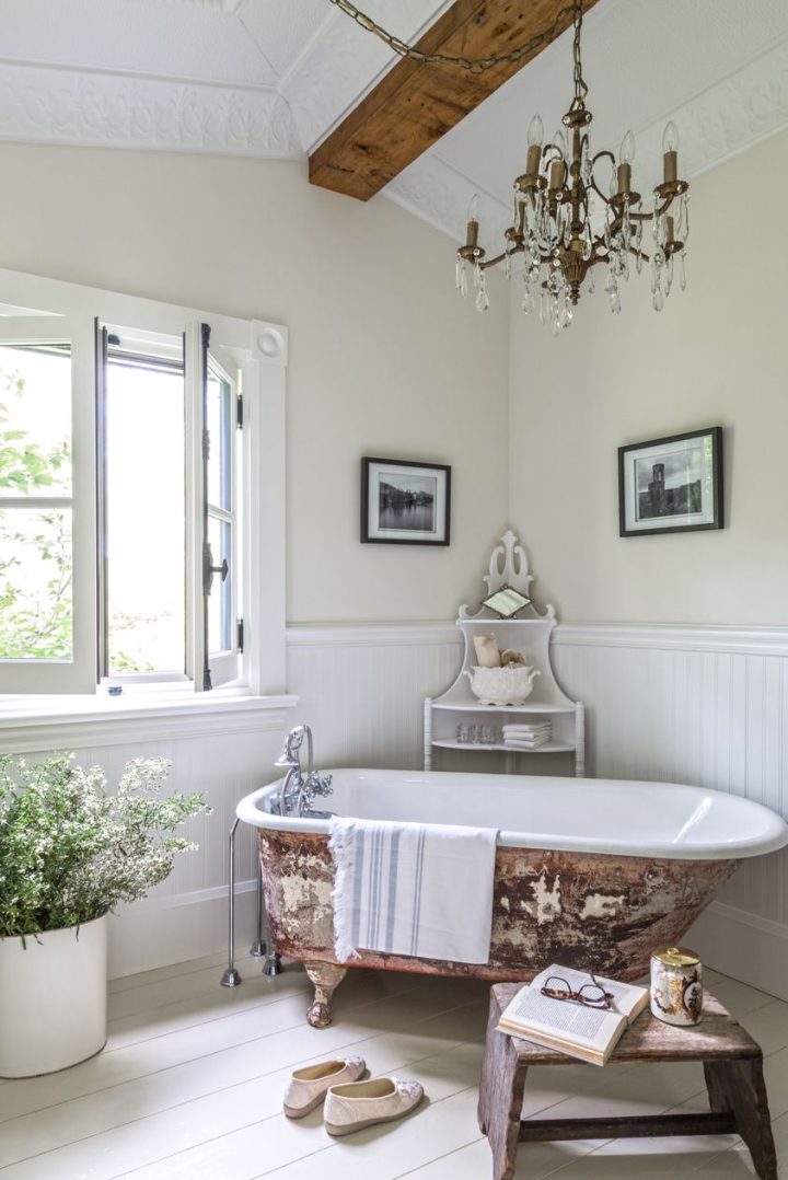 Clawfoot-antique-bathtub-and-beadboard-for-bath