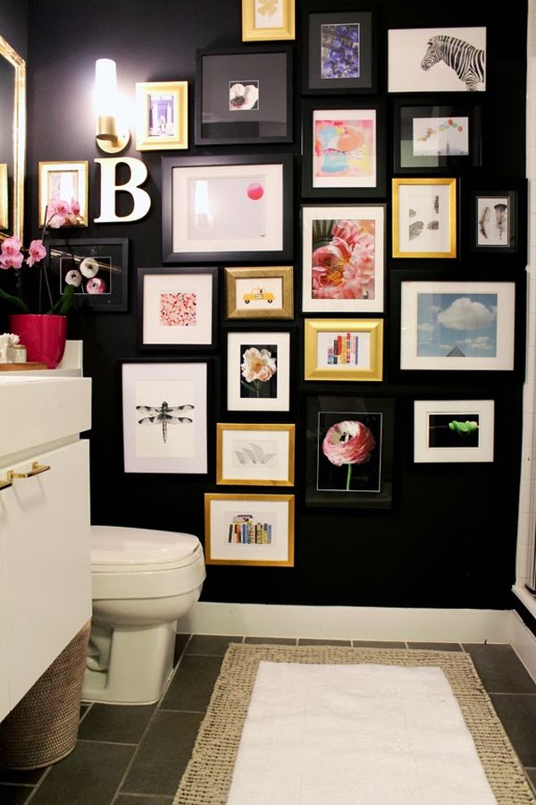 black-wall-bathroom-decorated-with-frames