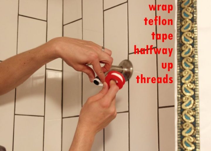 On-the-exposed-shower-arm-threads-wrap-Teflon-tape