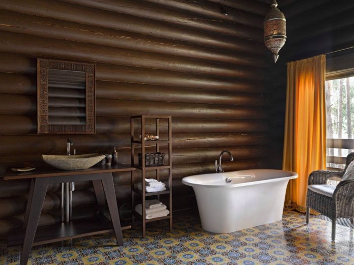 Mosaic-bathroom-tiles-and-wood-beams-painted