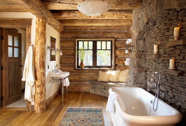 Wood-logs-and-stacked-rocks-for-rustic-bathroom