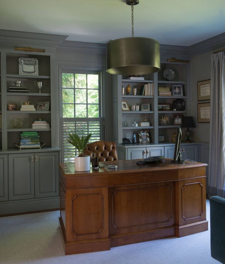 Masculine-office-with-a-gray-interior-design-and-executive-leather-chair