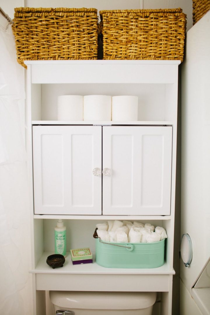 LArge-cabinet-with-doors-and-shelves-above-the-toilet