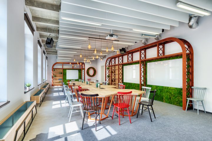 Opera-office-hexagonal-tables-and-green-wall