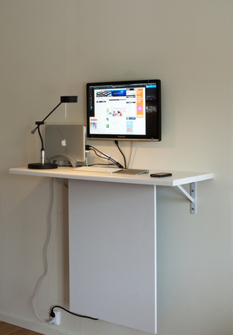 Standing-desk-with-wall-hanging