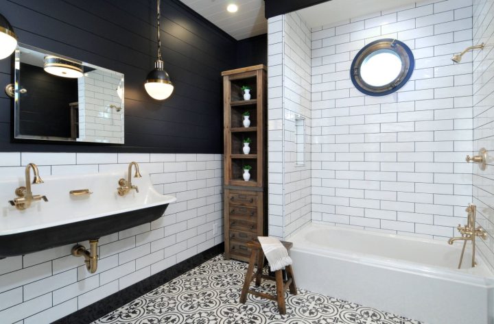 Black-beadboard-bathroom-and-brass-faucet