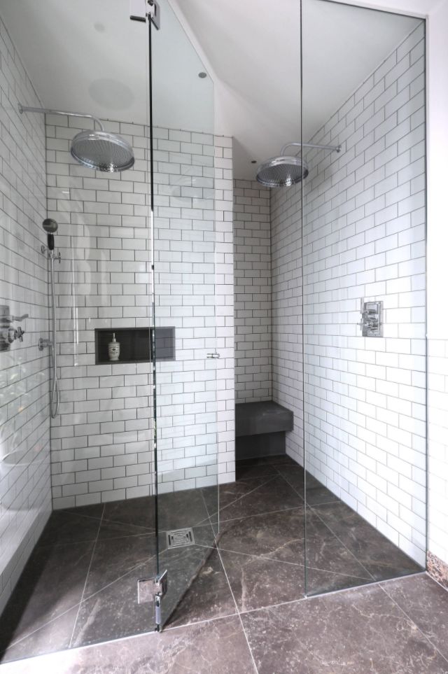 Walk-in-shower-with-subway-tiles-and-storage-niche