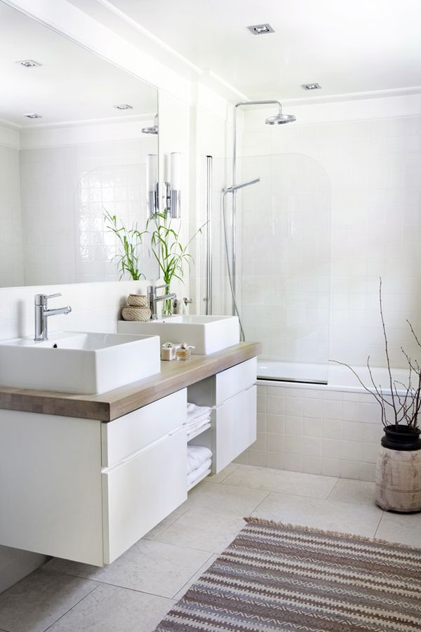 white-bathroom-bit-warm-decor-add-a-carpet