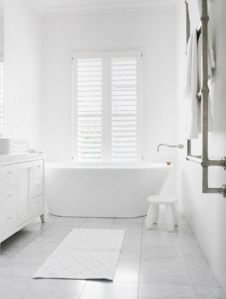 white-bathroom-with-concret-floor