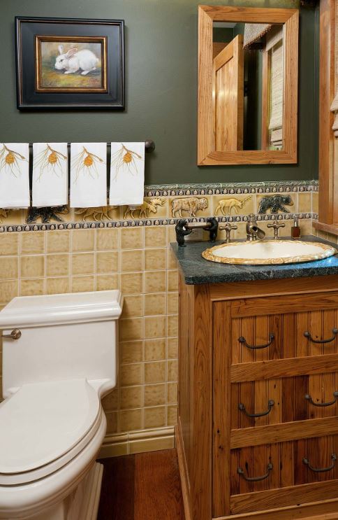 half-bathroom-with-tile-with-animals