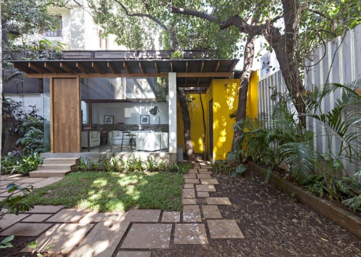 garden-pavilion-by-Abraham-John-Architects-yellow-accents