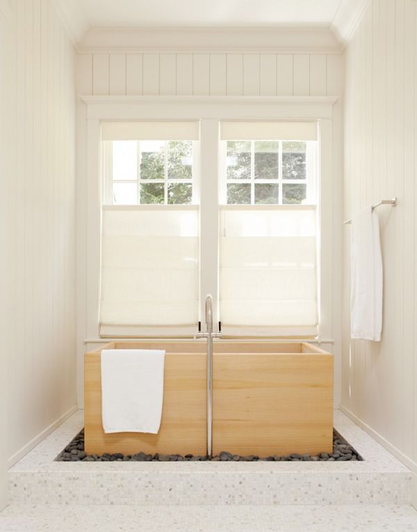 rocks-around-wooden-rectangular-bathtub